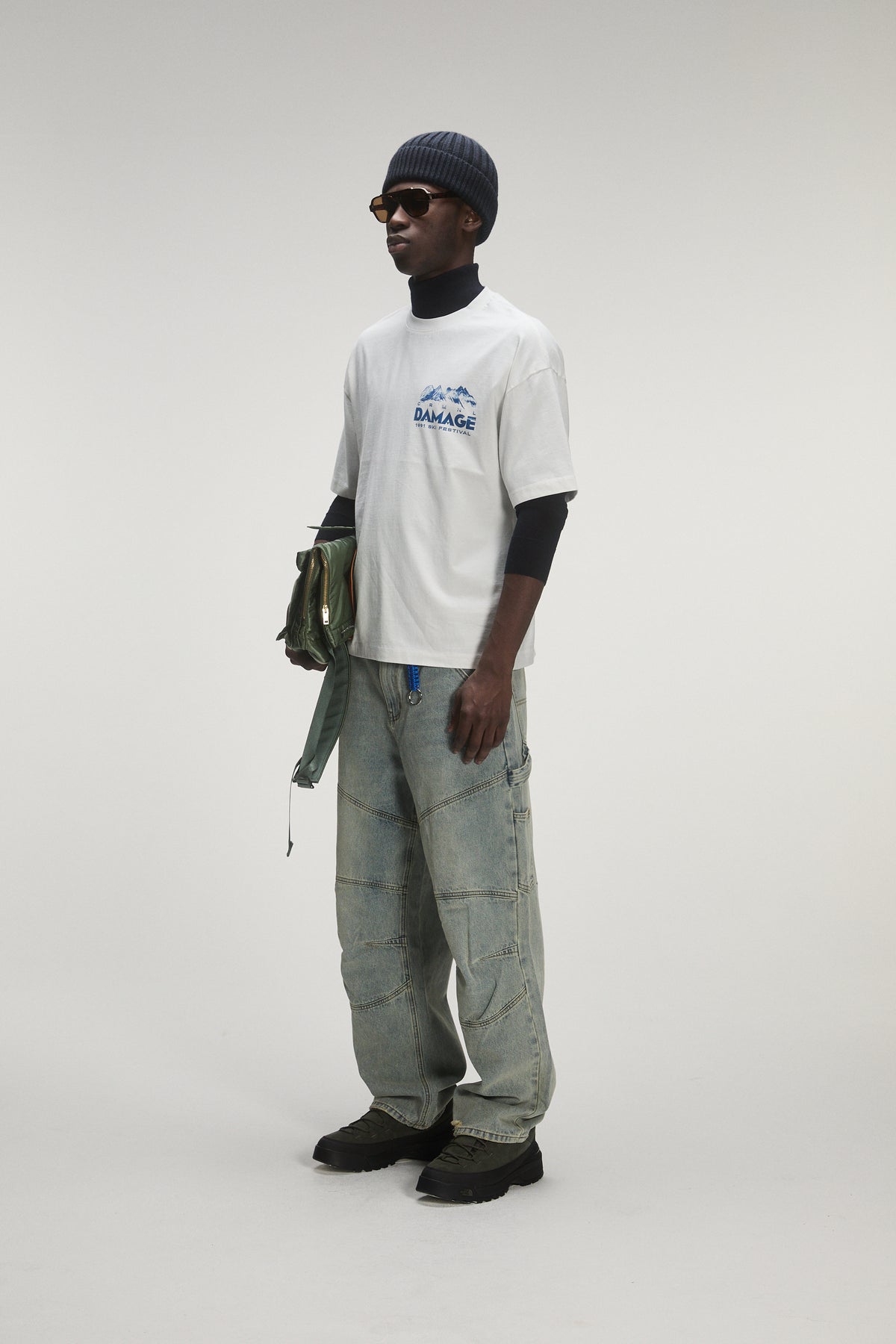 Male model wearing criminal damage t-shirt