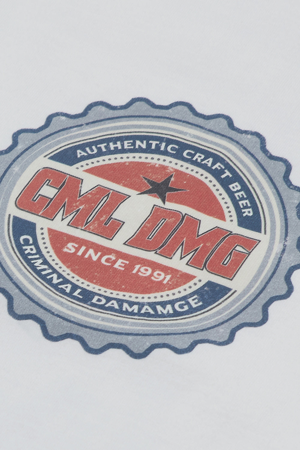 Close up of Criminal Damage logo on t-shirt