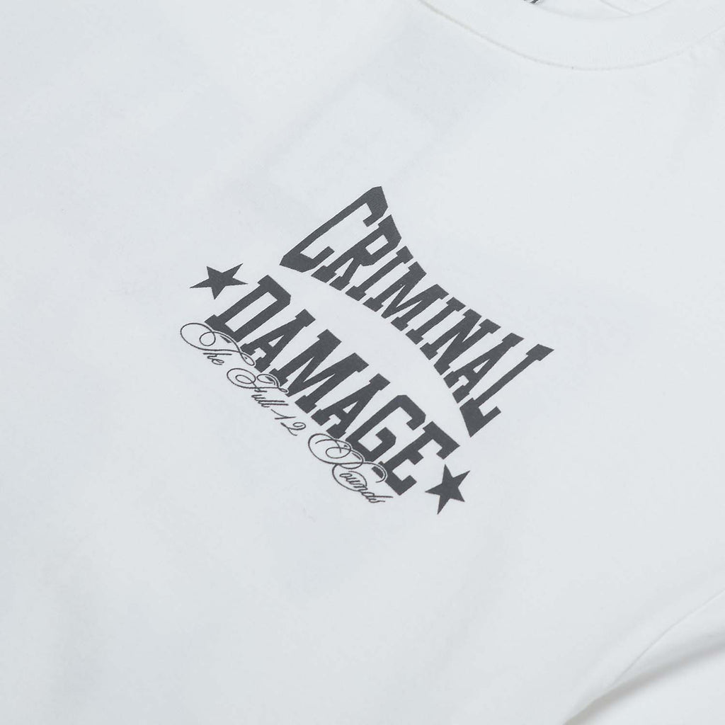 White sweatshirt with 'Criminal Damage' text design on a light gray background