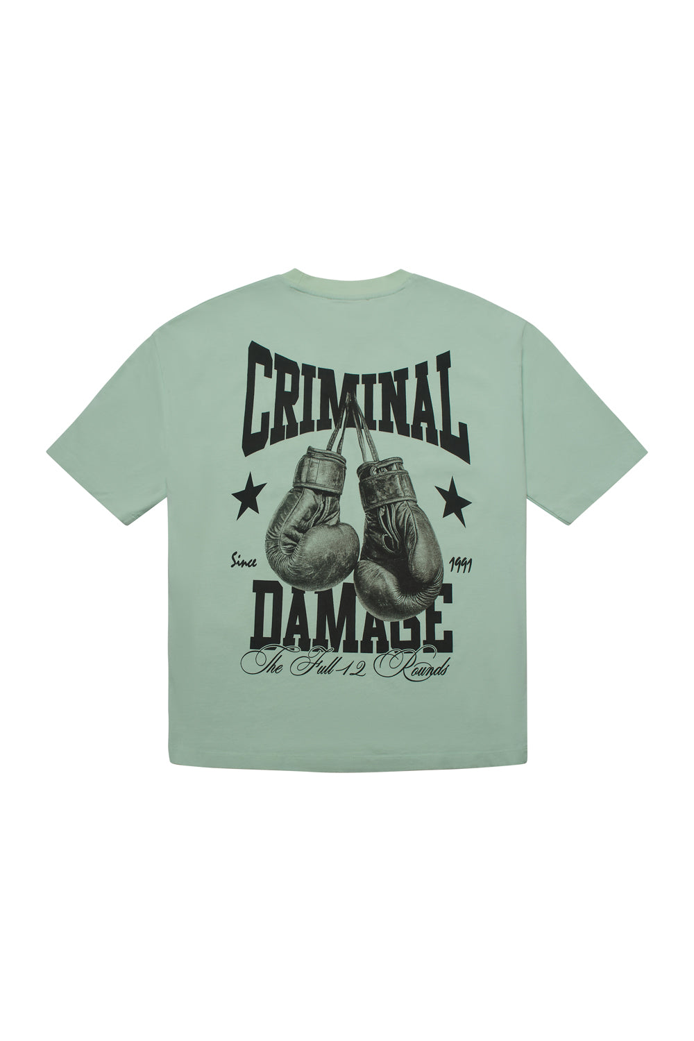 Light green Criminal Damage t-shirt with black boxing glove graphic and text on a white background
