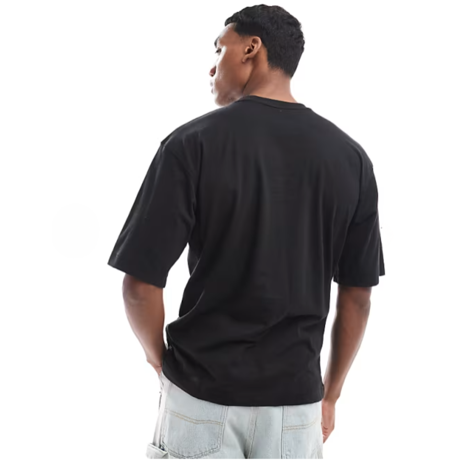 Person wearing a black t-shirt on a white background