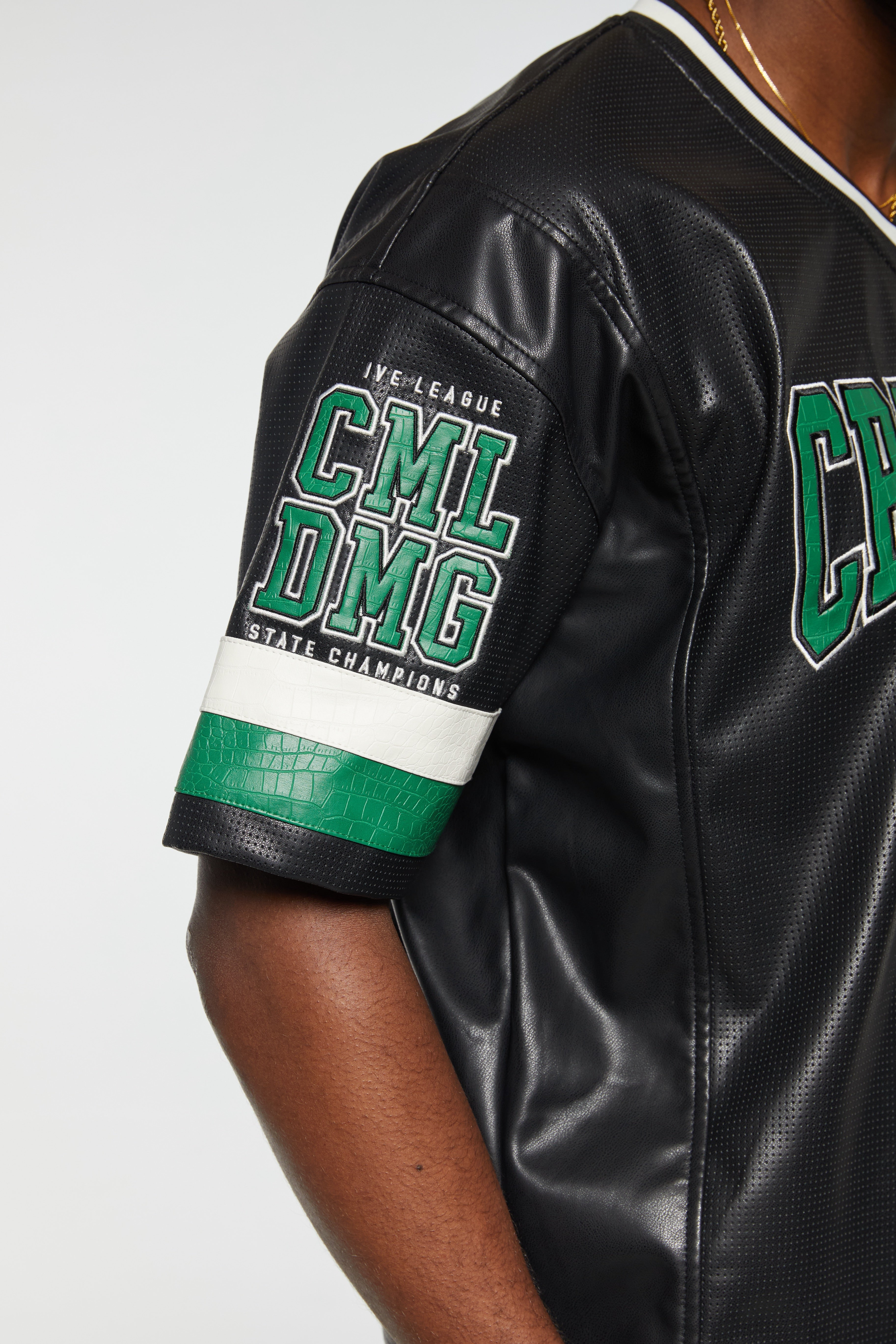STADIUM LEATHER V NECK TOP