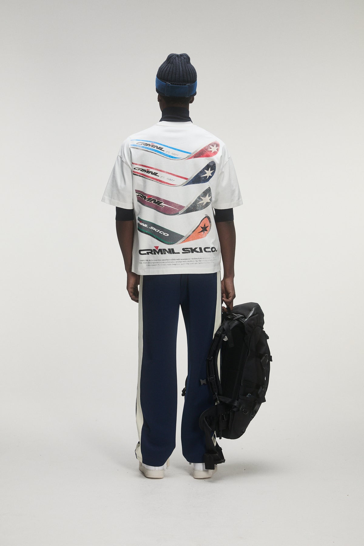 male model wearing criminal damage t-shirt