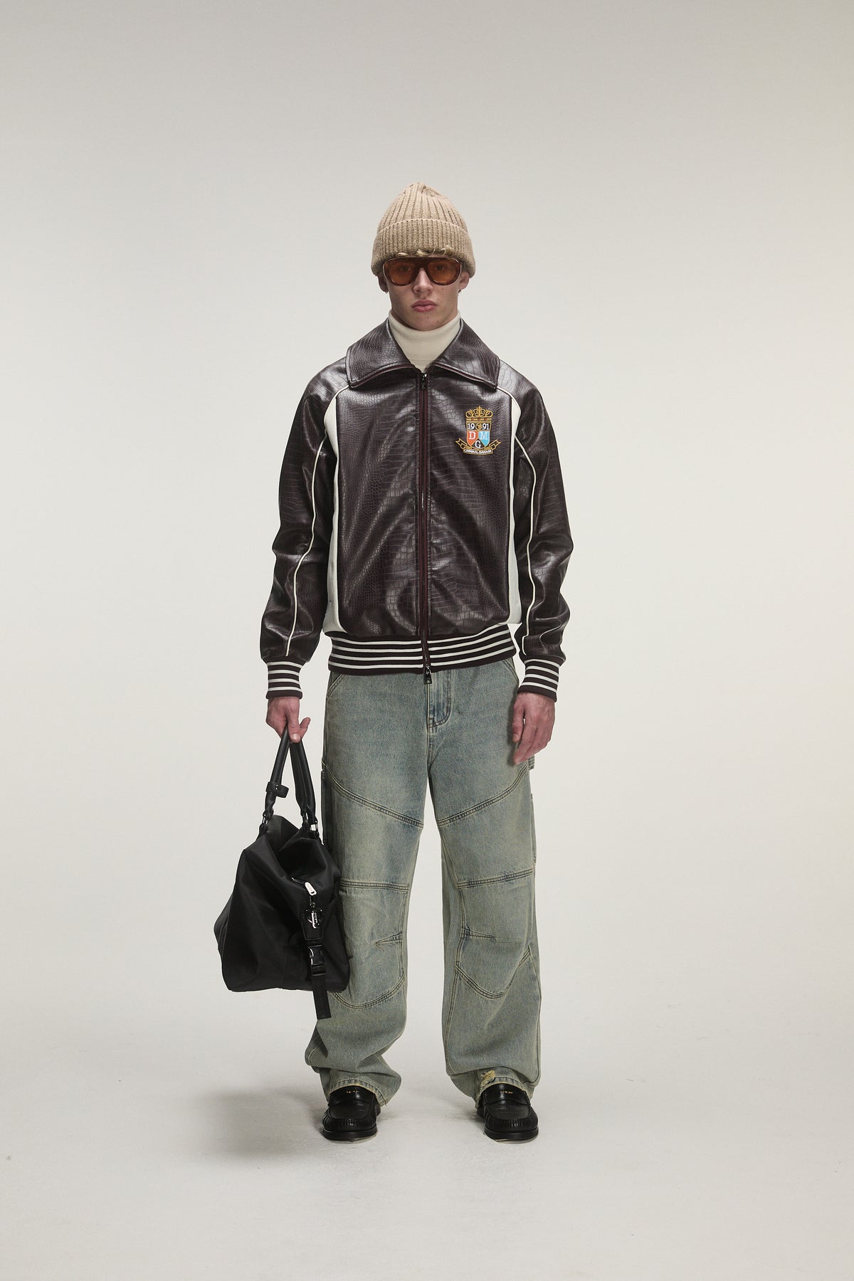 Male model wears criminal damage jacket