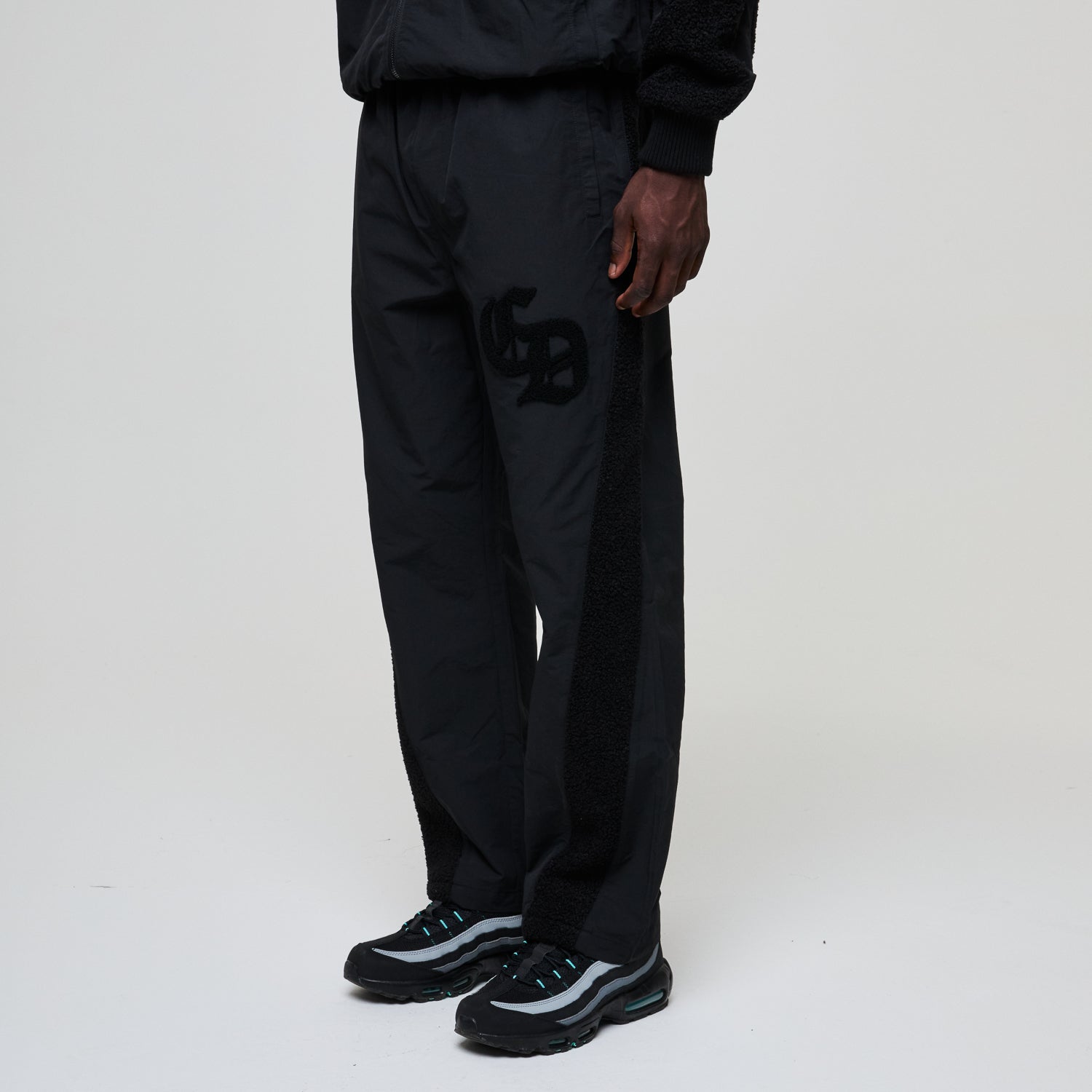 MICRO SHERPA & NYLON TRACK PANT