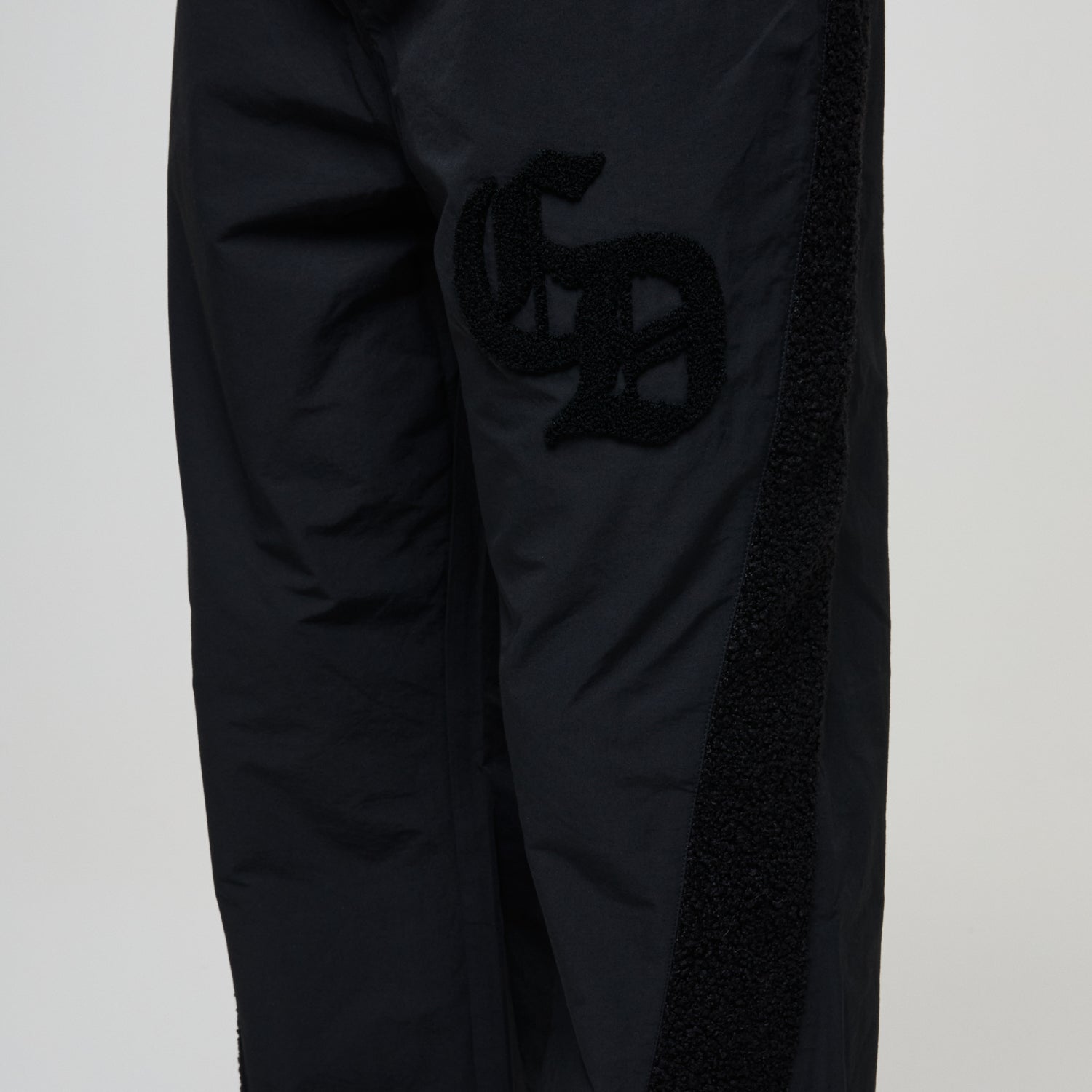 MICRO SHERPA & NYLON TRACK PANT