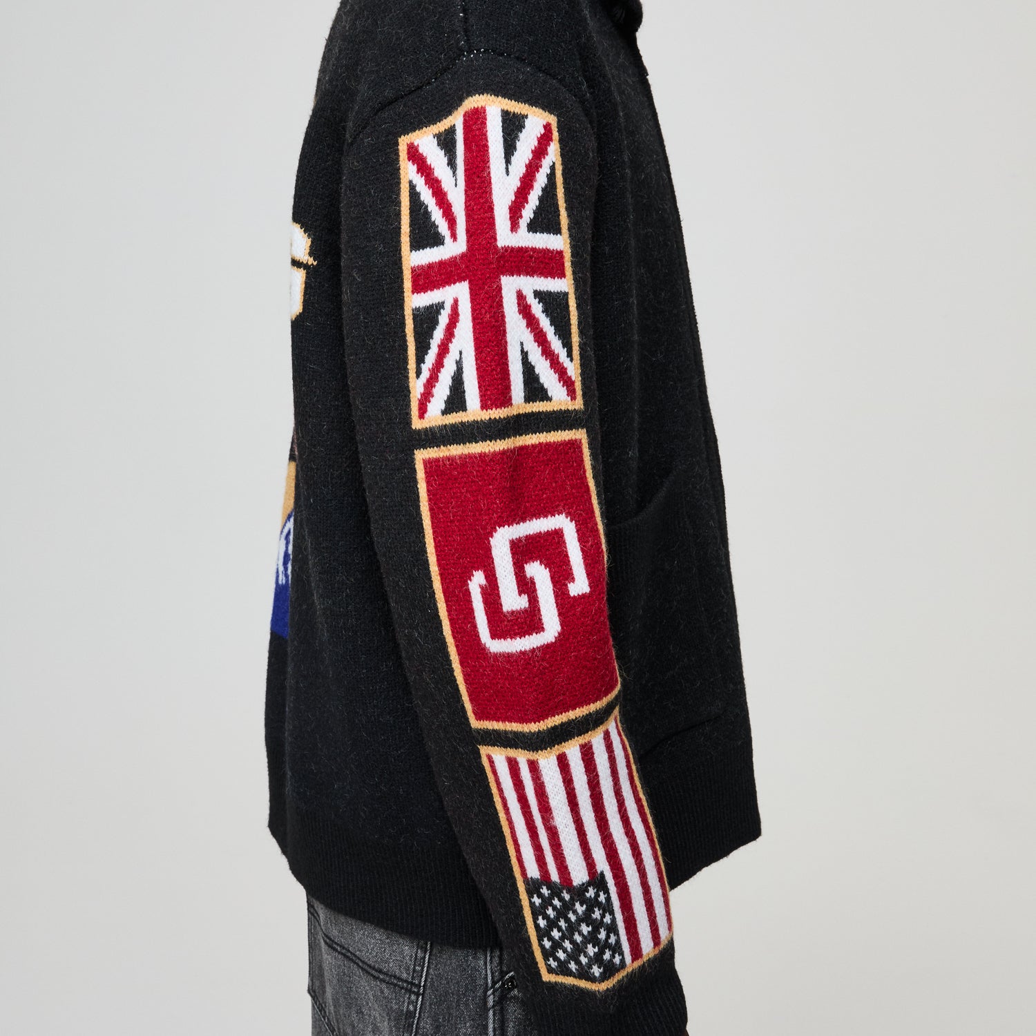 Black Criminal Damage jacket with embroidered designs 