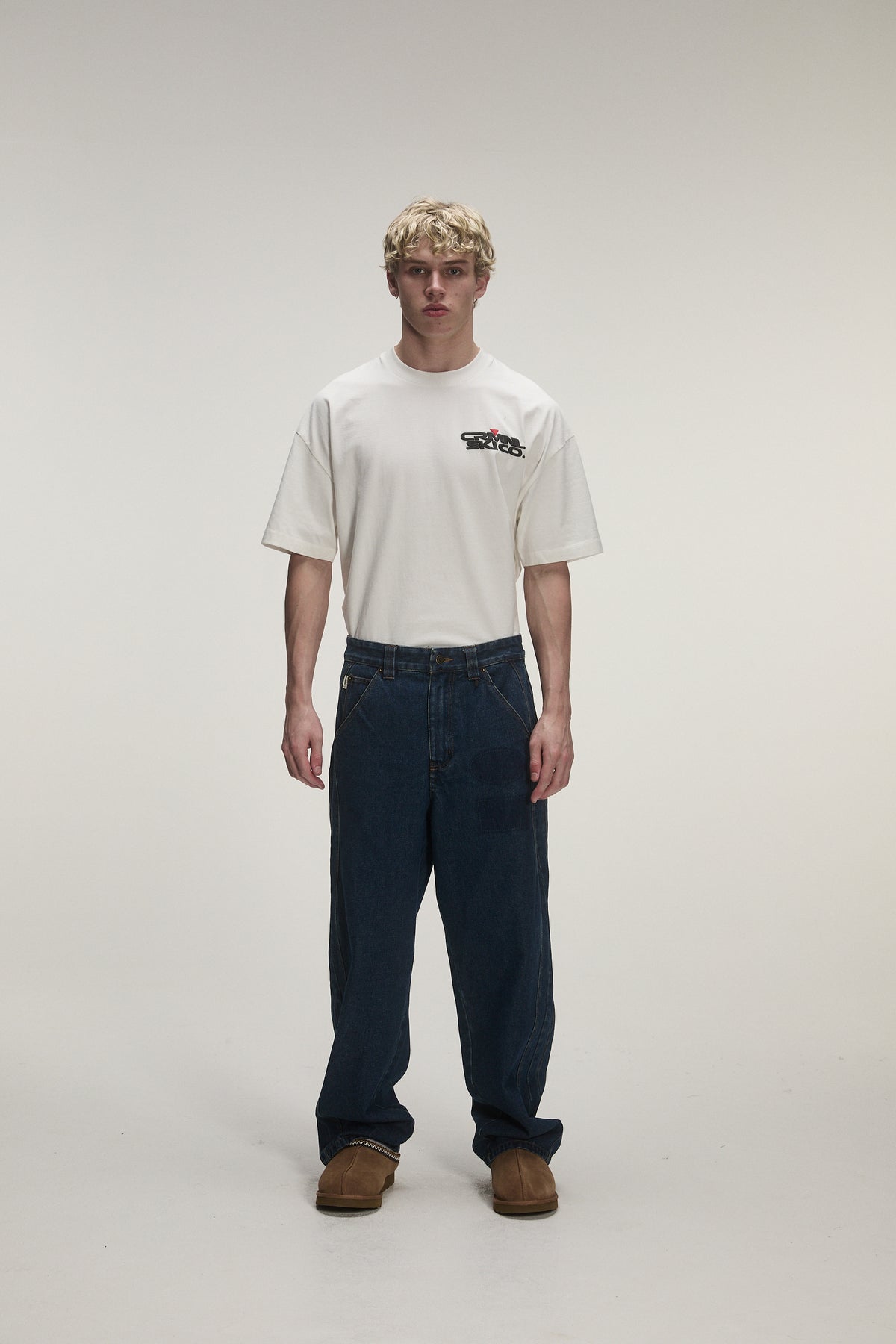 male model wearing criminal damage jeans