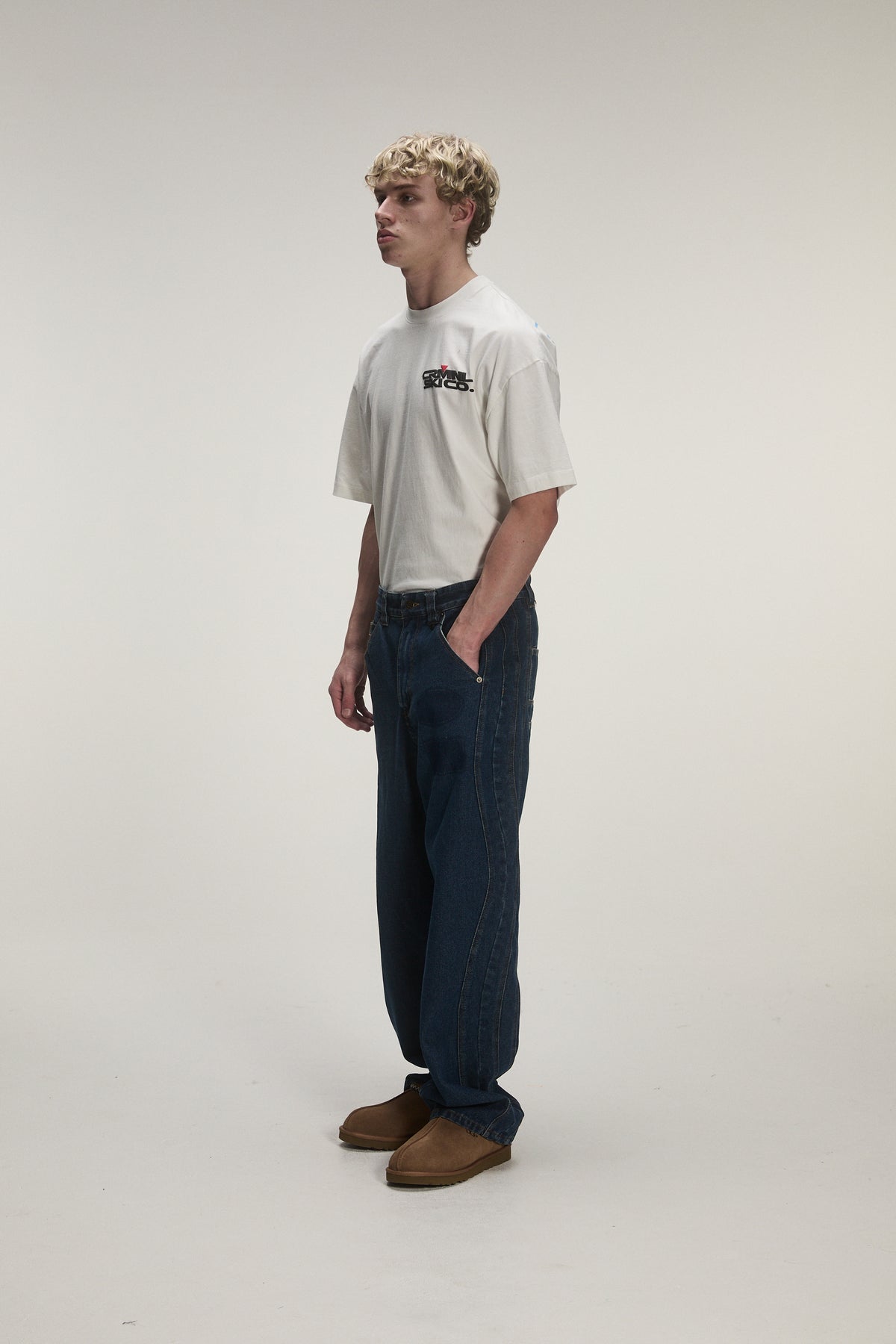 male model wearing criminal damage jeans