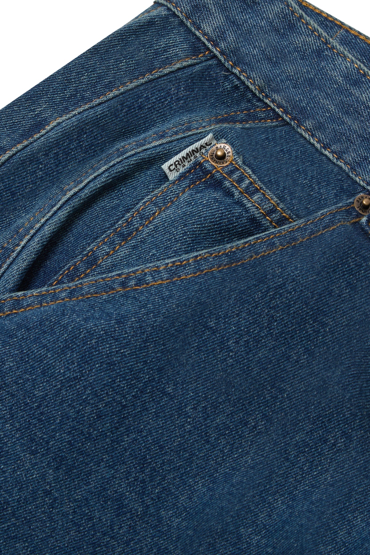 close up of criminal damage jeans