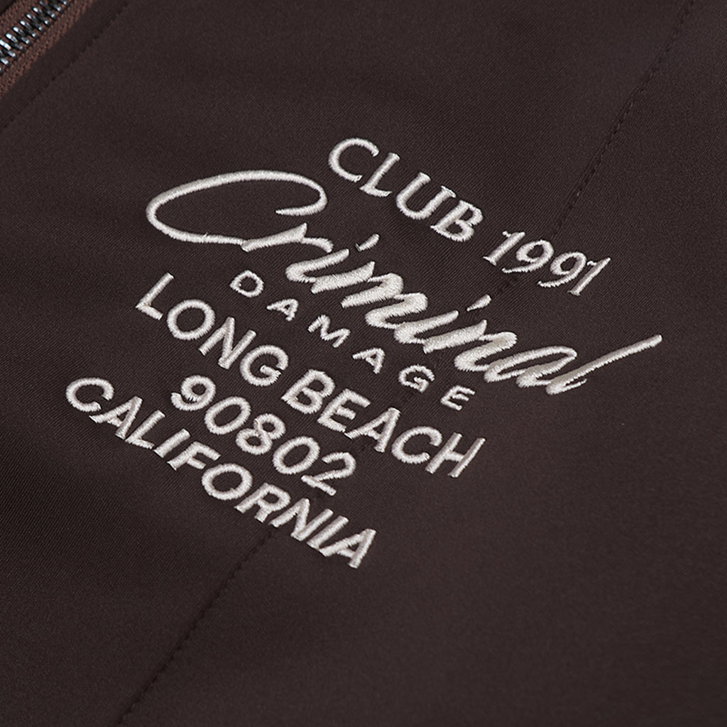 Embroidered text on a dark background, including 'CLUB 1991', 'Criminal Damage', 'LONG BEACH', and 'CALIFORNIA'.
