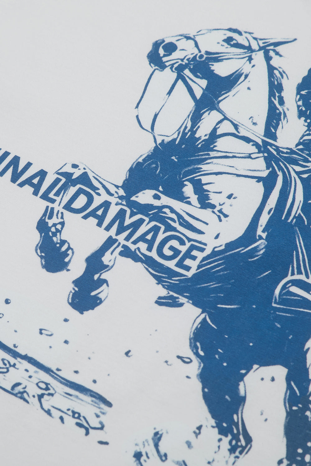 Close up of Criminal Damage print on t-shirt