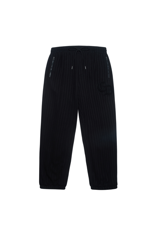 Black ribbed pants on a white background