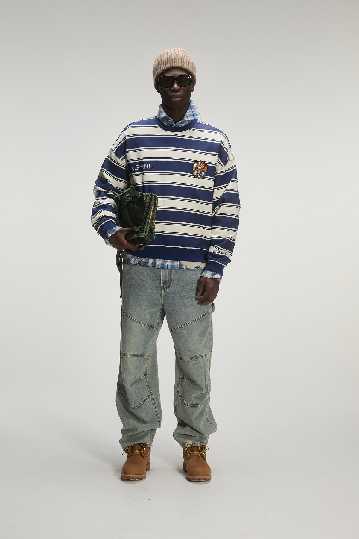 Male model wears criminal damage sweatshirt