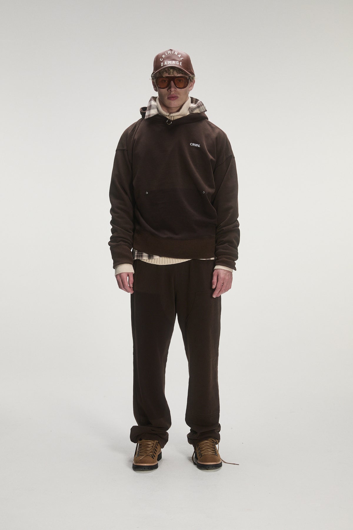 Male model wearing criminal damage hoodie