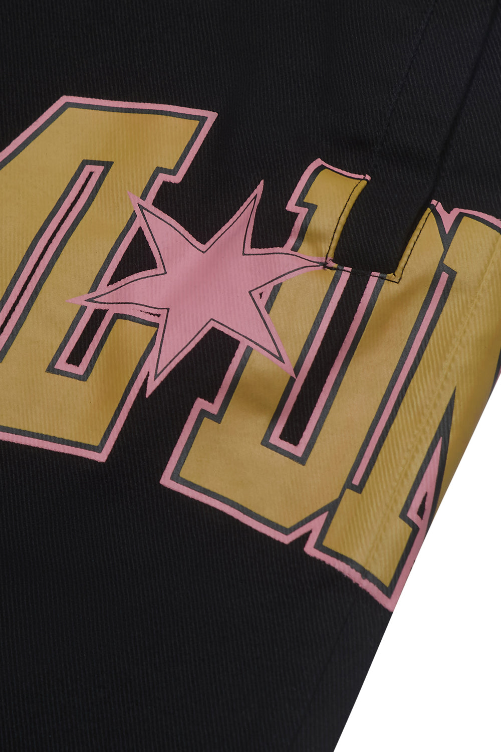 Close up of Criminal Damage logo on short